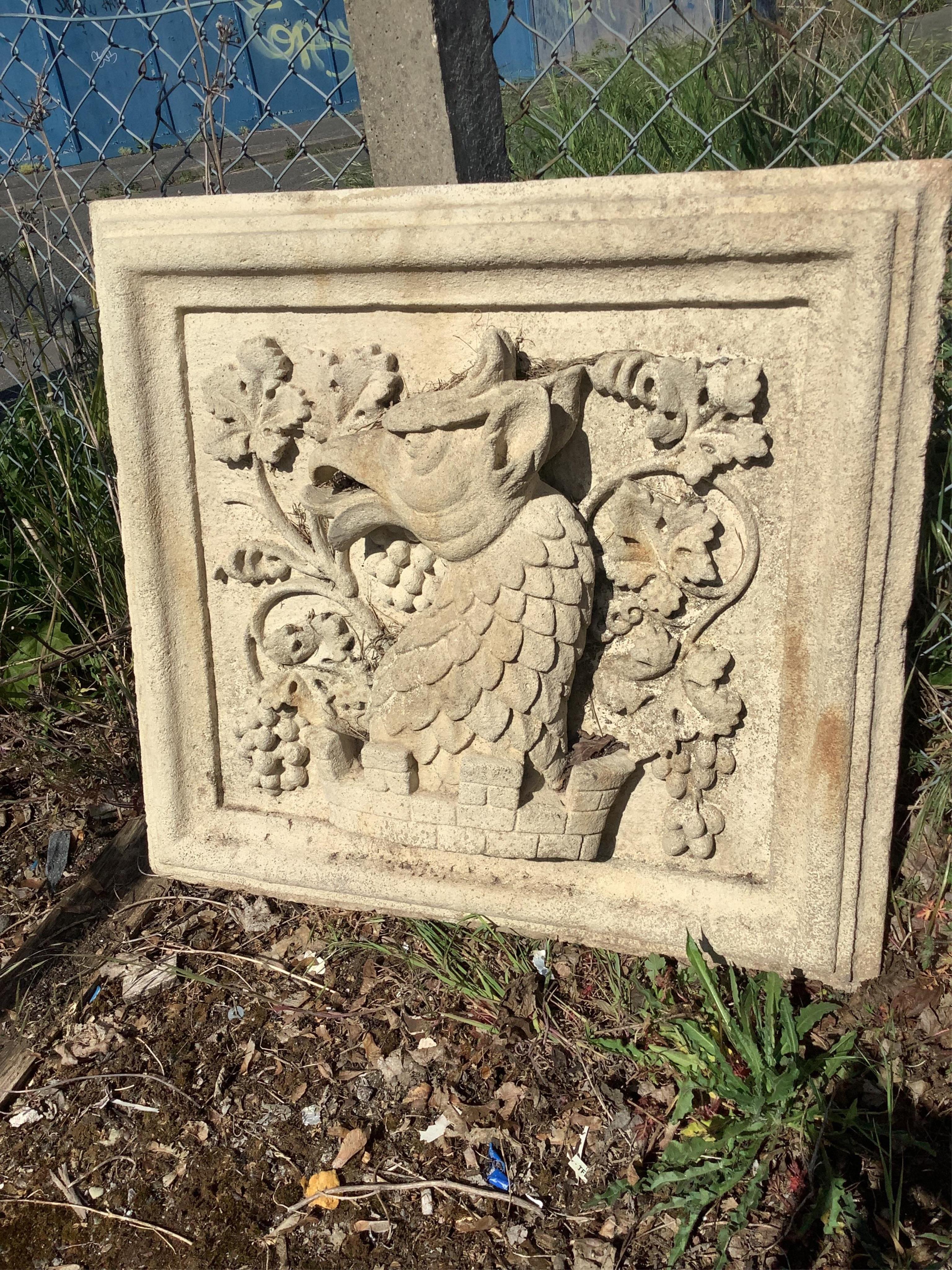 A rectangular cast stone Heraldic garden plaque, width 82cm, height 79cm
